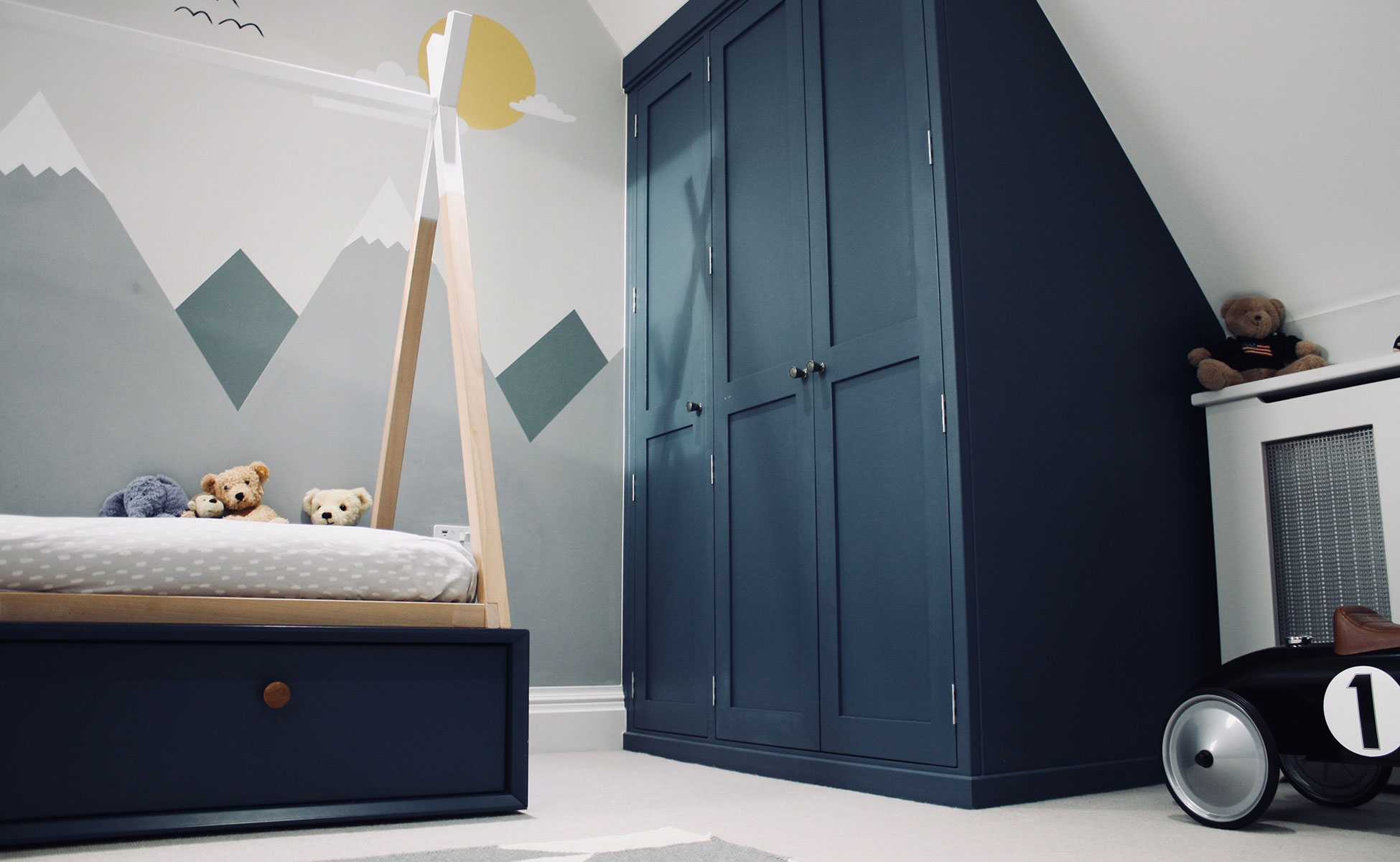 Bespoke angled wardrobes by Rao Furniture